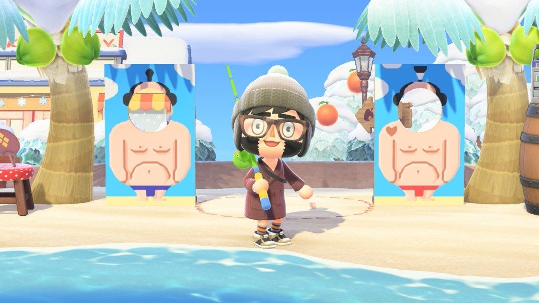 Mein Avatar in Animal Crossing mit Angel am Strand.